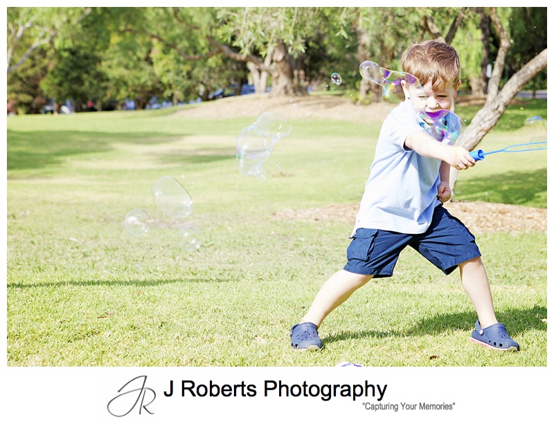 Extended or multi generation family portraits in the park and beach Sydney